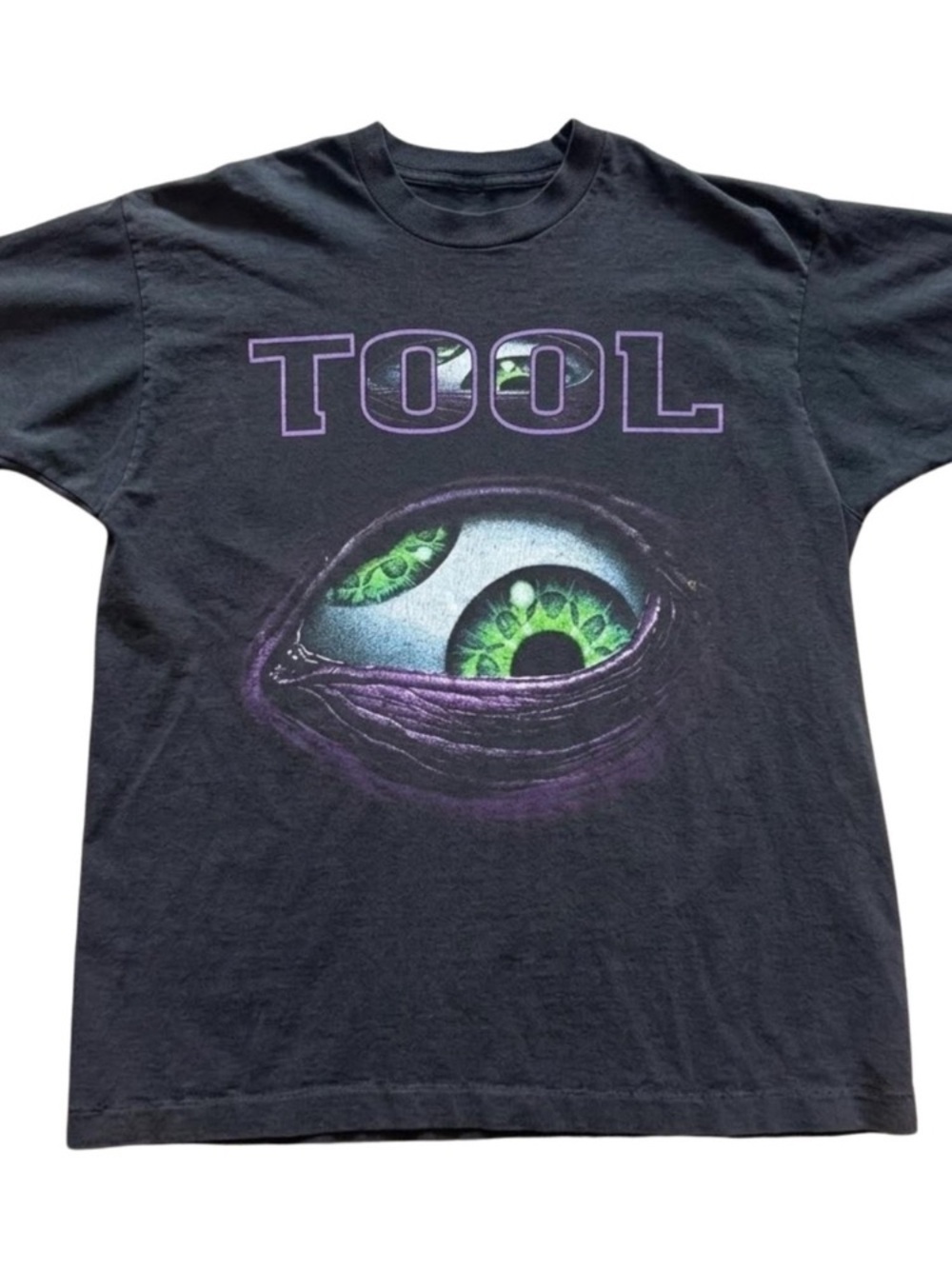 Black Graphic Tee with Green Eye Design